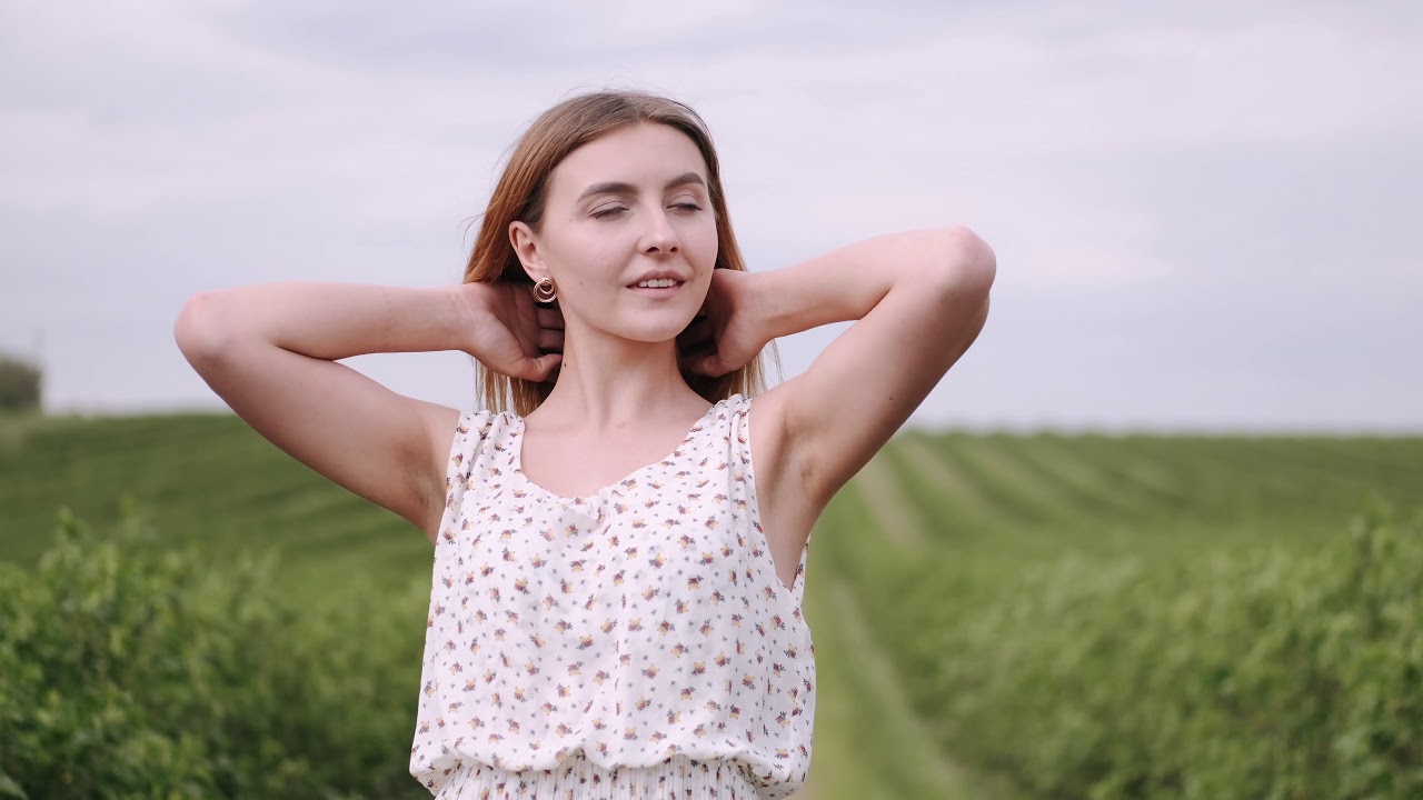 Copyright free 4k stock footage || Woman in White Floral Dress Posing