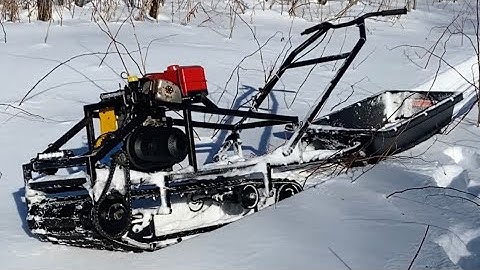 Homemade Track sled/snowdog  deep snow drift and drive around