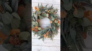 Adding a touch of fall to my mixed eucalyptus wreath #wreaths #wreathmaking #falldecor #autumndecor