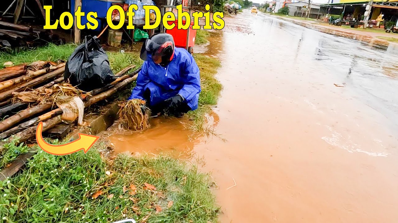 Unclogging Culvert Completely Blocked With Debris Stuck Drain - YouTube