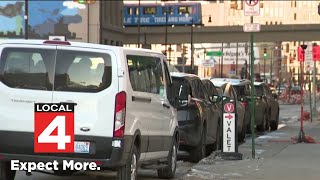 Michigan AG warns against parking scams during Detroit Auto Show