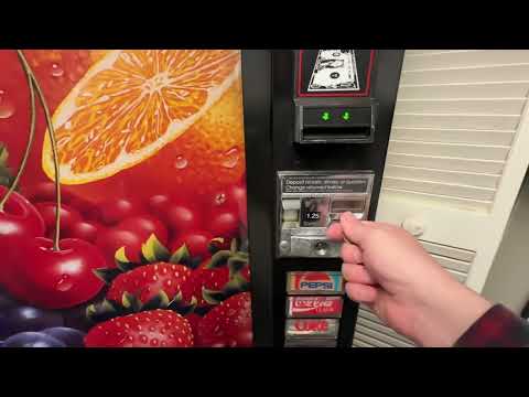 Getting another warm soda from a vintage vending machine!