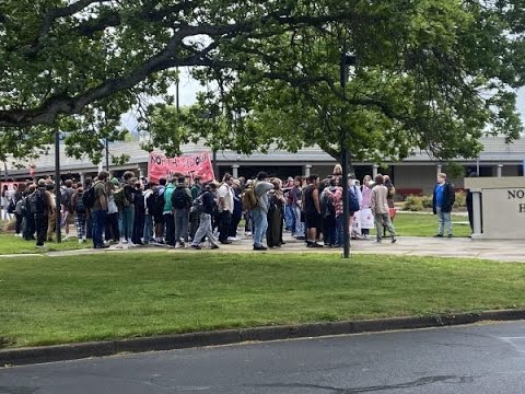 Dozens of North Medford High school students protest budget cuts