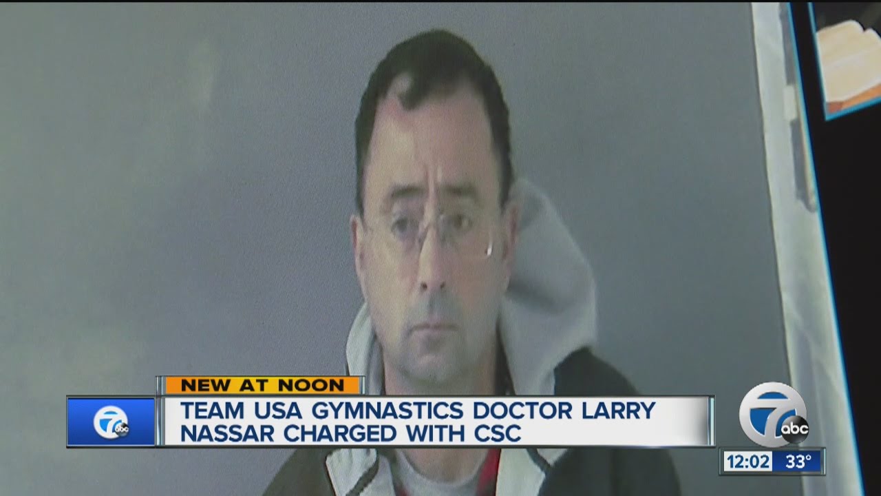 Olympics doctor charged with abusing children