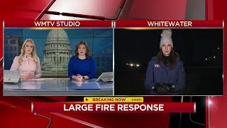 Employees return to work as fire crews continue to battle flames at Whitewater collection site