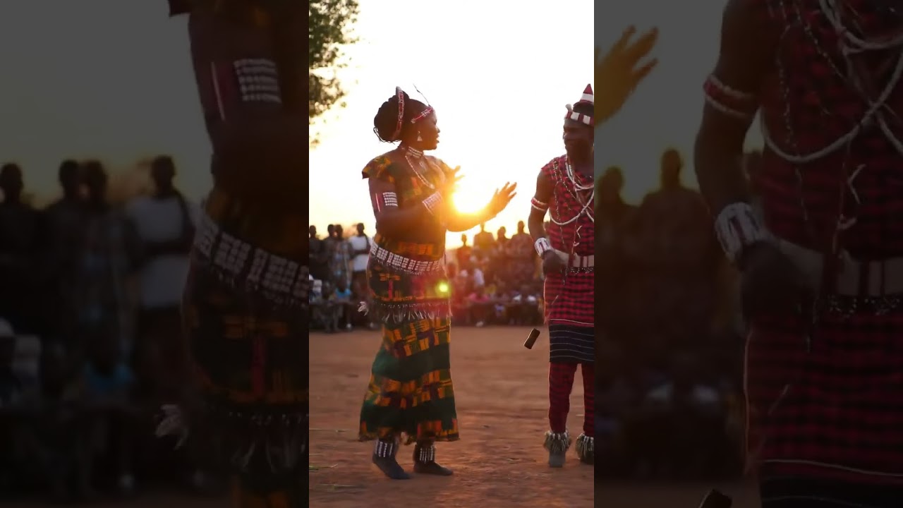 Queen dancing in village for the King! 