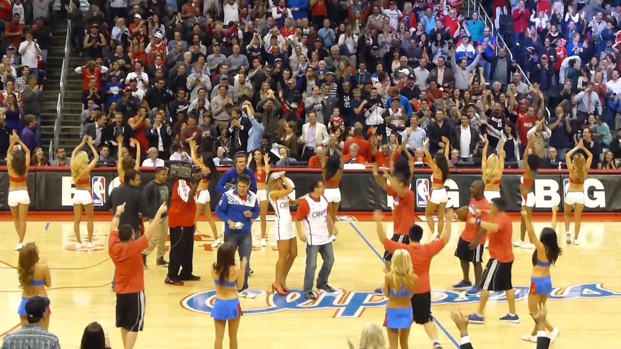 Live shot of Clipper fan making half court shot
