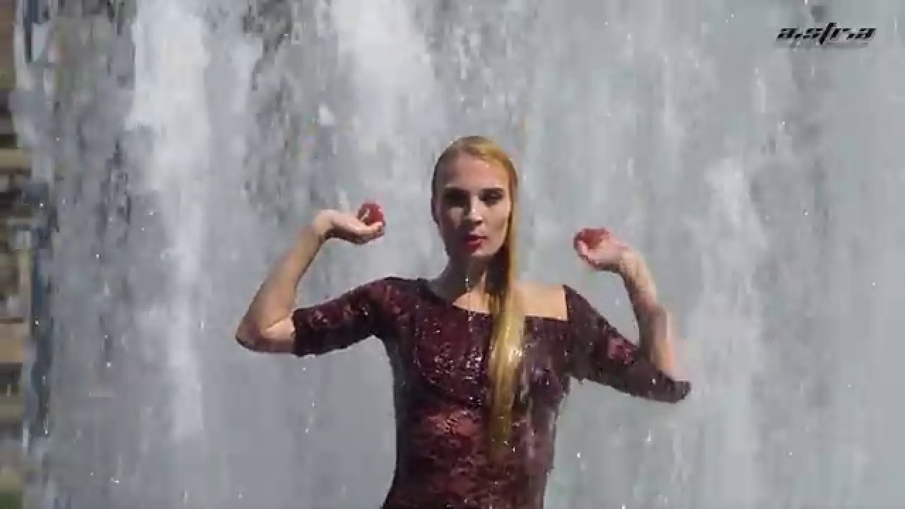 Eva gets wet in her elegant business outfit!    #wetlook #berlin #wetdress