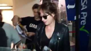September 20th, 2014 - Dakota Johnson arrives at LAX Airport in Los Angeles