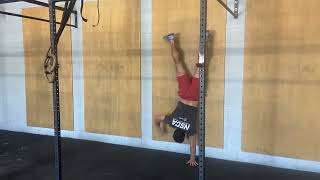Handstand hip taps