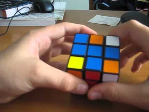 Video: Come Risolvere Il Primo Strato Del Cubo Di Rubik