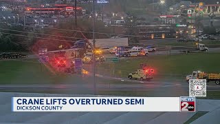 Crews bring out crane to lift overturned semi on I-40E exit ramp in Dickson County