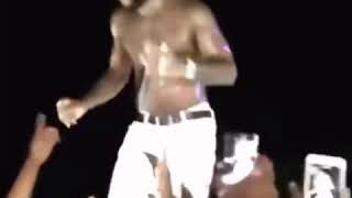 Burna boy kicks a Zambian fan that tried to rob him on stage