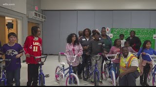 Firefighters donate bikes to local students
