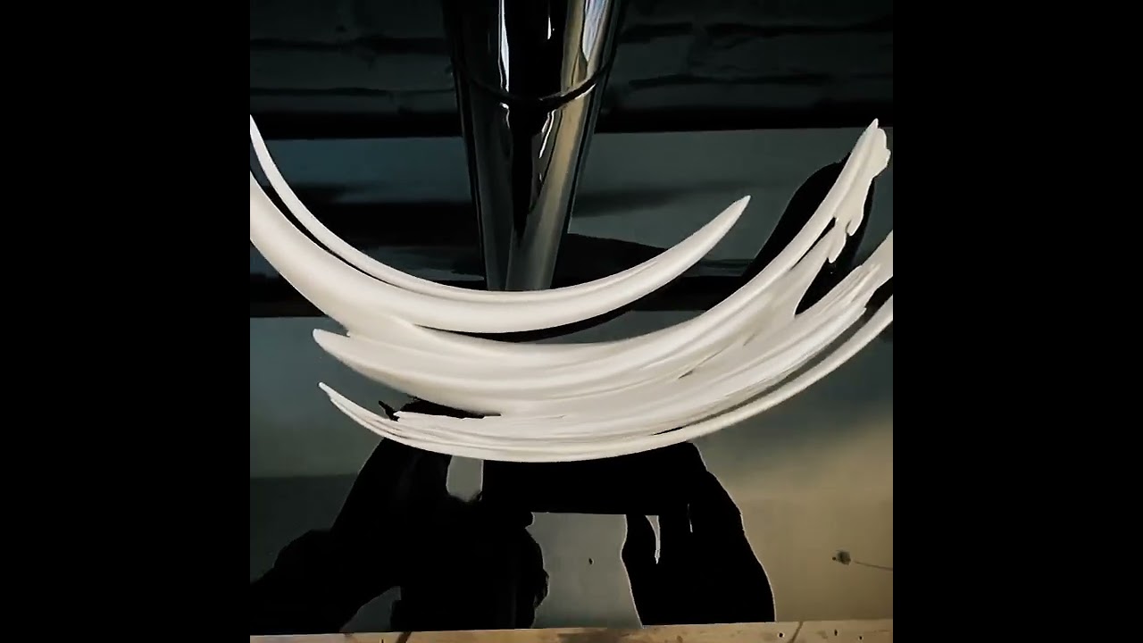 Emerging from water (silver) — Emerging from water (silver) - Emerging from Water in Silver.mp4