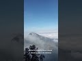 Drone shot Land Above the Clouds: Stunning Views from Mount Telomoyo Peak Overlooking Merapi