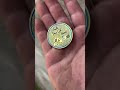 Titanium coin with blue channel and yellow electro anodize.