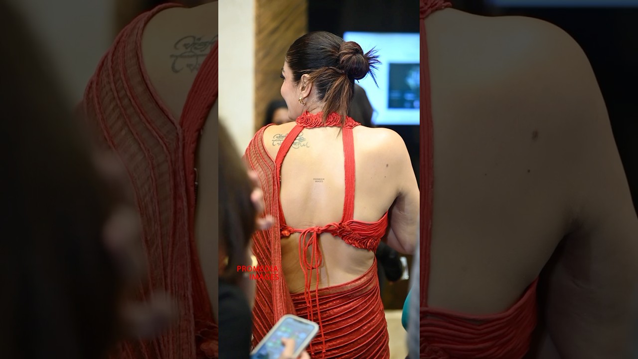 1/3 Raveena Tandon flaunting her tattoo in a hector neck backless blouse at Elle Awards | ProMedia
