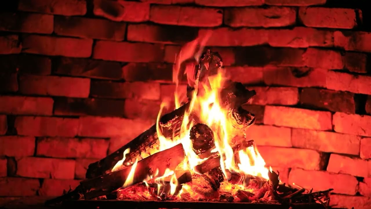 Jazz elegant calm music on the background of the flame fireplace camping. Atmospheric video bar cafe