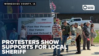 Iowa Attorney General visits NE Iowa town is welcomed by protesters
