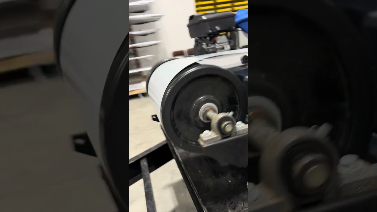 Manufacturing Textured White Board & Batten metal siding this morning! 