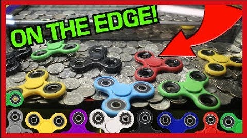 WINNING FIDGET SPINNERS FROM A COIN PUSHER!!! | Arcade Games | JOYSTICK