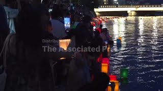 Lanterns light up Hiroshima river on 80th anniversary of atomic bombing