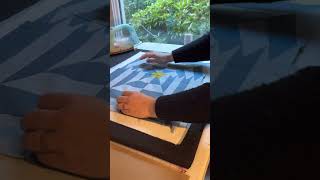 Basting a mini quilt with a fusible powder