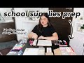school supplies prep: binder setup, labelling, organizing