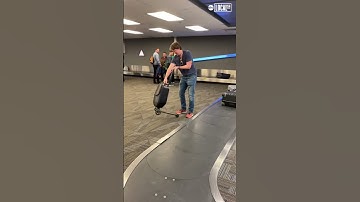 Man rides scooter luggage. #travel #airport #adventure