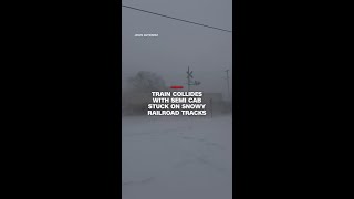 Train plows into semi-truck on snowy North Carolina railroad tracks