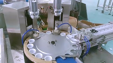 Automatic Rubber Insert Pressing Machinery Caps wadding lining equipment two heads with cap feeder