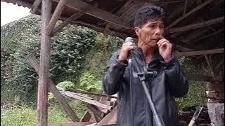 Riza Kaban. Lagu 'Rasamken Kekelengen/Emas Megersing'. Ciptaan : Junaidy Sinuhaji.