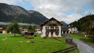 Bavarian roads and Alps mountains. Bus ride from Munich to Neuschwanstein Castle, Germany.