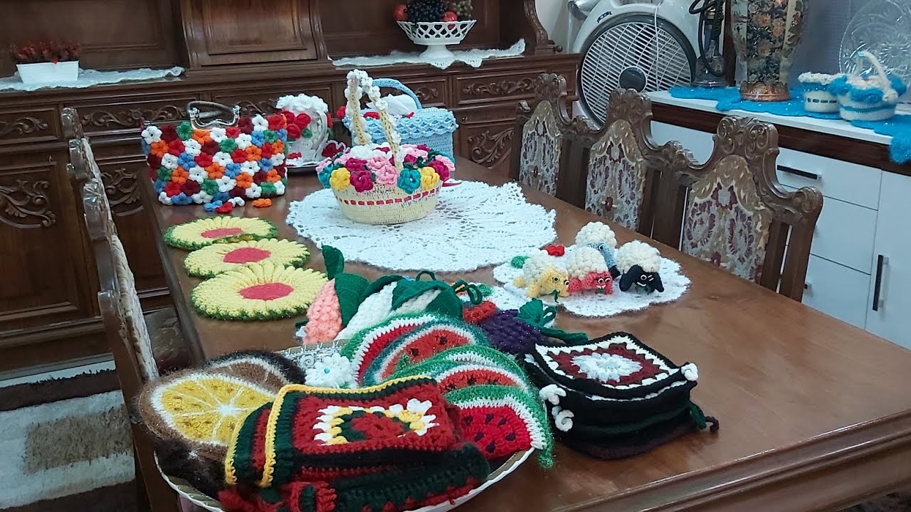 عرض اعمال يدويه (كروشيه)اكسسوارات مطبخ وجنط وشالات يدويه