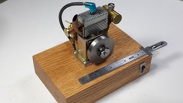 MINIATURE, 4 - STROKE, INTERNAL COMBUSTION ENGINE WITH SPARK IGNITION