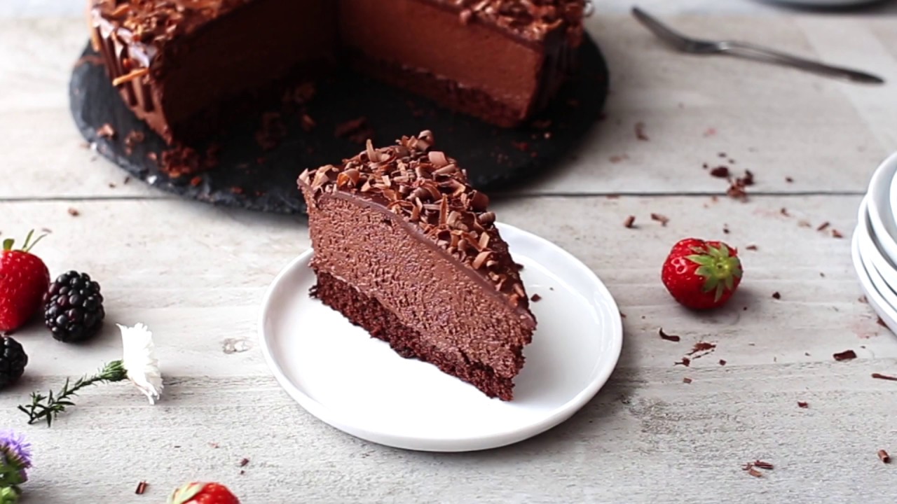 Soft and moist chocolate cake layer topped with super creamy chocolate mous...