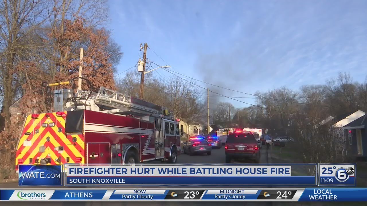 Firefighter hurt while battling house fire - YouTube