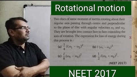 Two discs of same moment of inertia rotating about their regular axis passing through centr