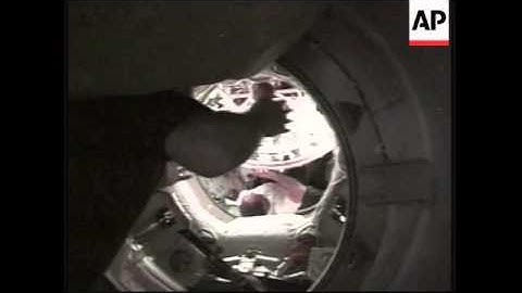 Space shuttle Atlantis docks with space station