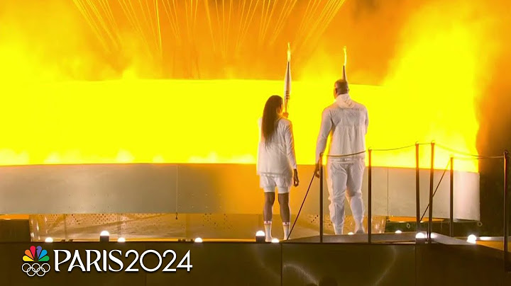 The Olympic Cauldron is lit at the 2024 Paris Olympics Opening Ceremony | NBC Sports
