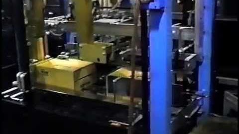 Massman Automation Designs, LLC Wraparound Case Packer for Oil Filters