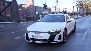 Audi e-tron GT in Suzuka Grey Driving in the city