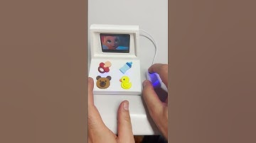 BebeComputer with ESP32 plays videos with sound from SD card. The volume can be adjusted via buttons