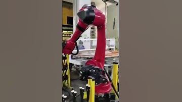 Industrial robots work on the stamping production line