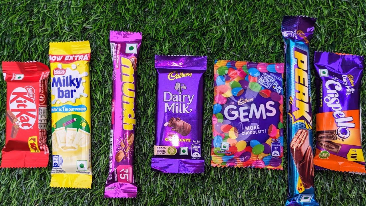 Lots of chocolate Munch Dairy milk chocolate vs MilkyBar Chocolate Perk Bar One Chocolate Gems