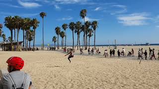 Girl Balancing In An Elastic Rope At Venice Beach