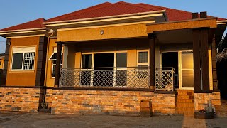 Touring a 4 bedrooms house for sale in kira at 400million