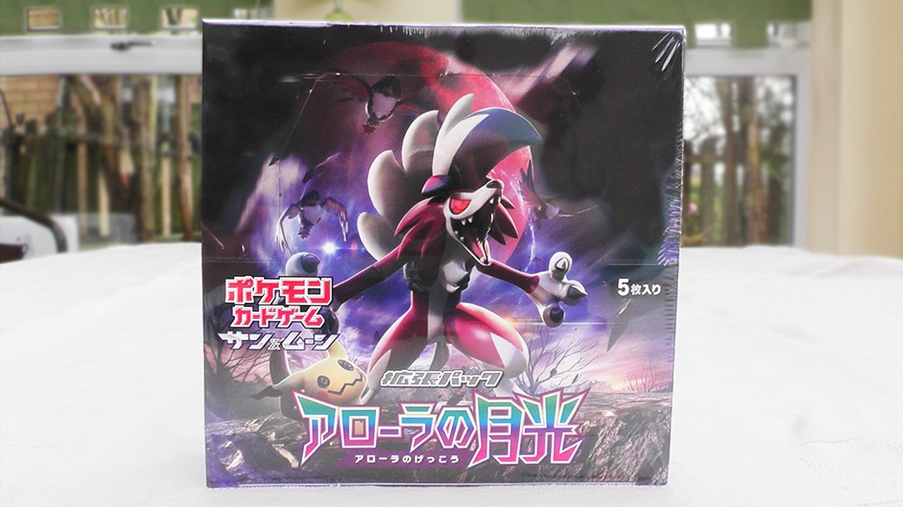 Opening an ENTIRE Pokemon Alolan Moonlight Booster Box!