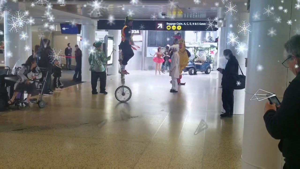 Christmas celebration at SEATAC Airport... YouTube